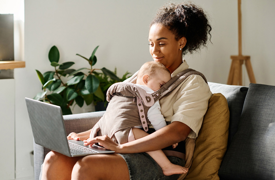 Woman working with newborn baby